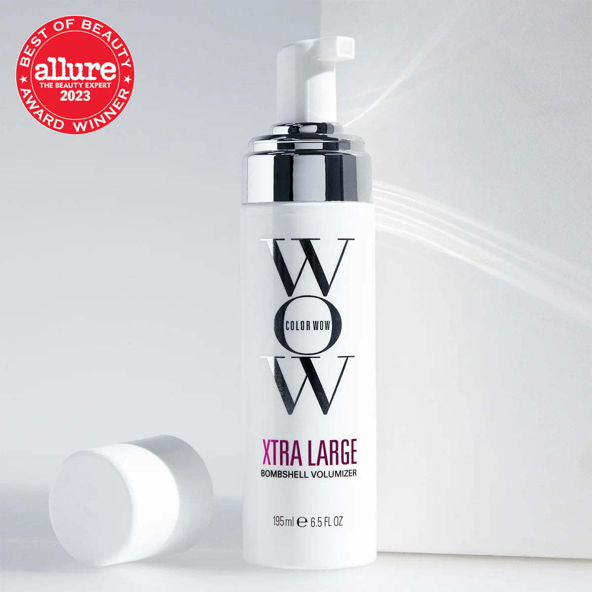 Wow hair product bottle with 'Allure Best of Beauty 2023' award on a white background