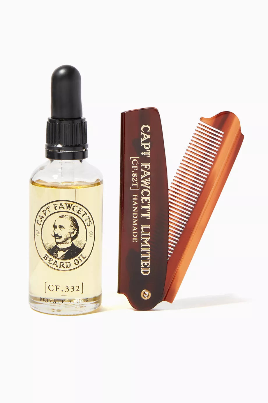 A bottle of Capt. Fawcett Limited beard oil with a black dropper cap next to a brown folding comb and a wooden comb, all on a clean white background.
