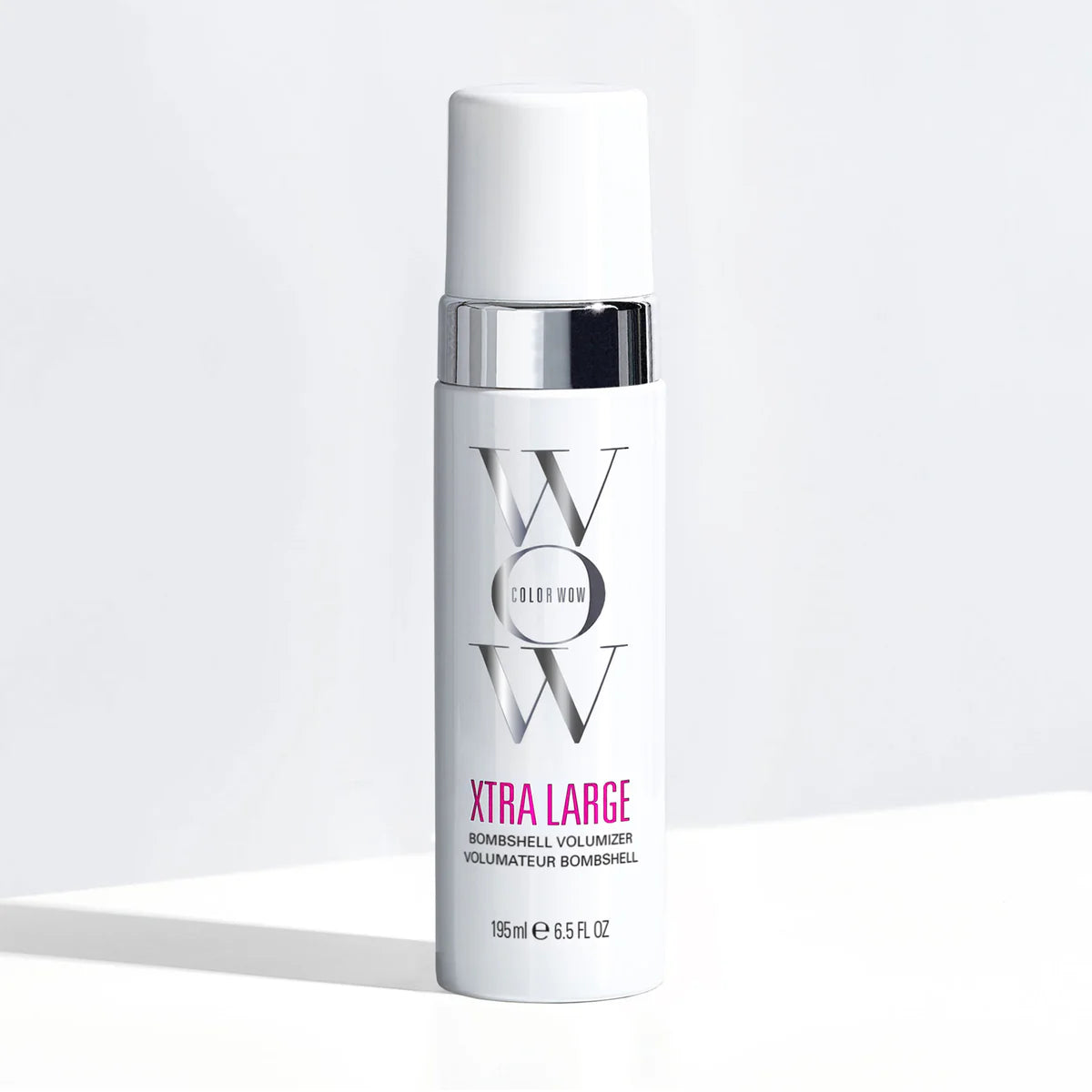 Bottle of Color Wow Xtra Large Bombshell Volumizer on a white background