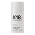 K18 Biomimetic Hairscience leave-in molecular repair hair mask bottle on a white background