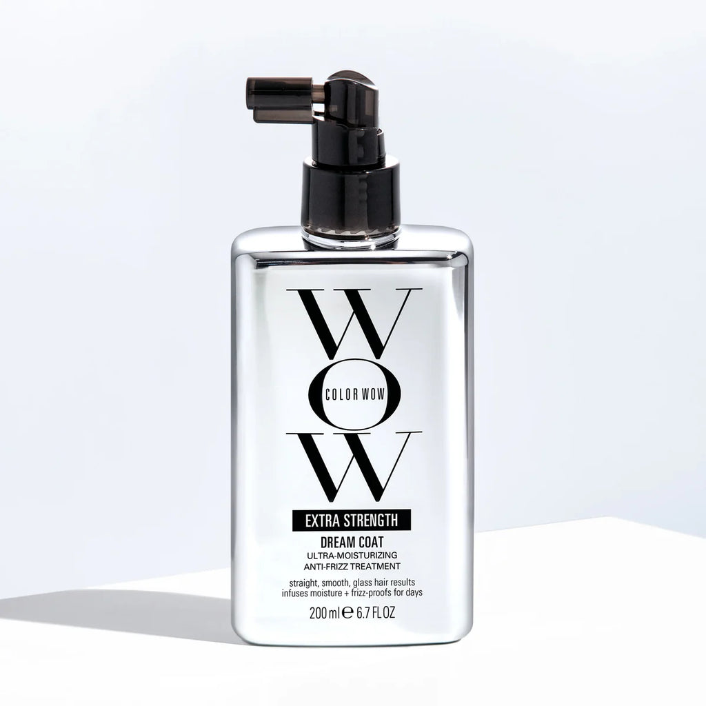 Bottle of Color Wow Extra Strength Dream Coat hair treatment on a light background