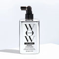 Bottle of Color Wow Extra Strength Dream Coat hair treatment on a light background