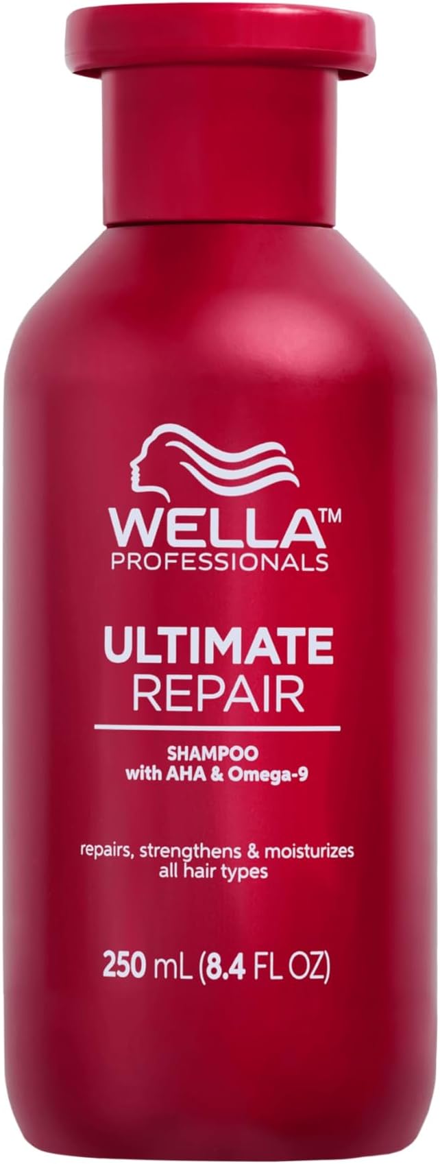 Red shampoo bottle labeled 'Wella Professionals Ultimate Repair' on a white background