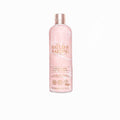 Pink bottle of Baylis & Harding body wash with cherry blossoms on a light background