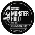 Uppercut Deluxe Monster Hold hair product container with black and white design.