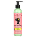 Hair care product bottle with pink label and green pump on white background
