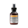 Bottle of Davines hair product on a white background