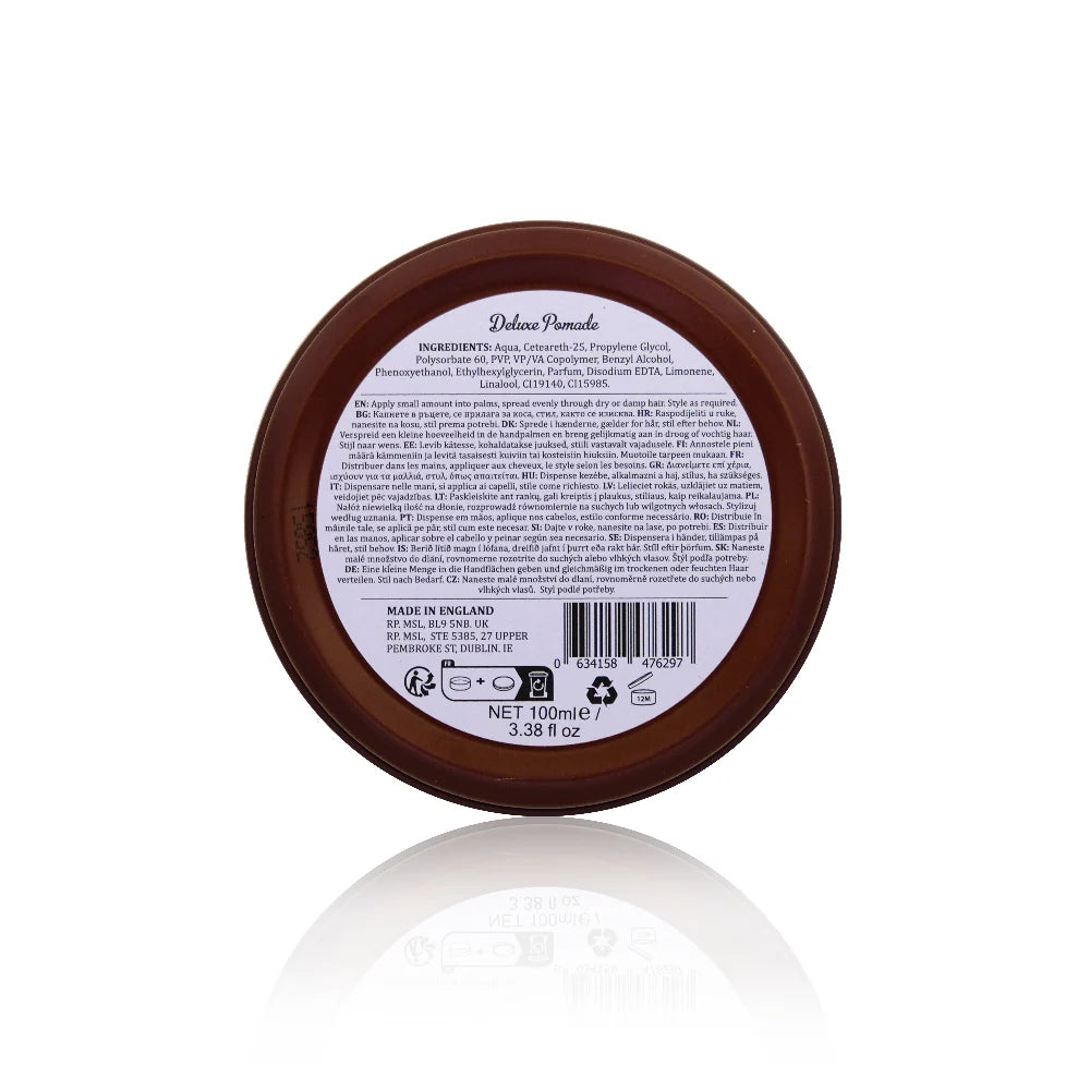 Round brown container with label on a white background