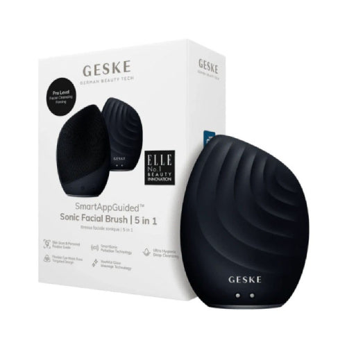 Black facial brush with packaging on a white background