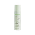 A bottle of Kevin Murphy Heated Defense hair treatment foam.