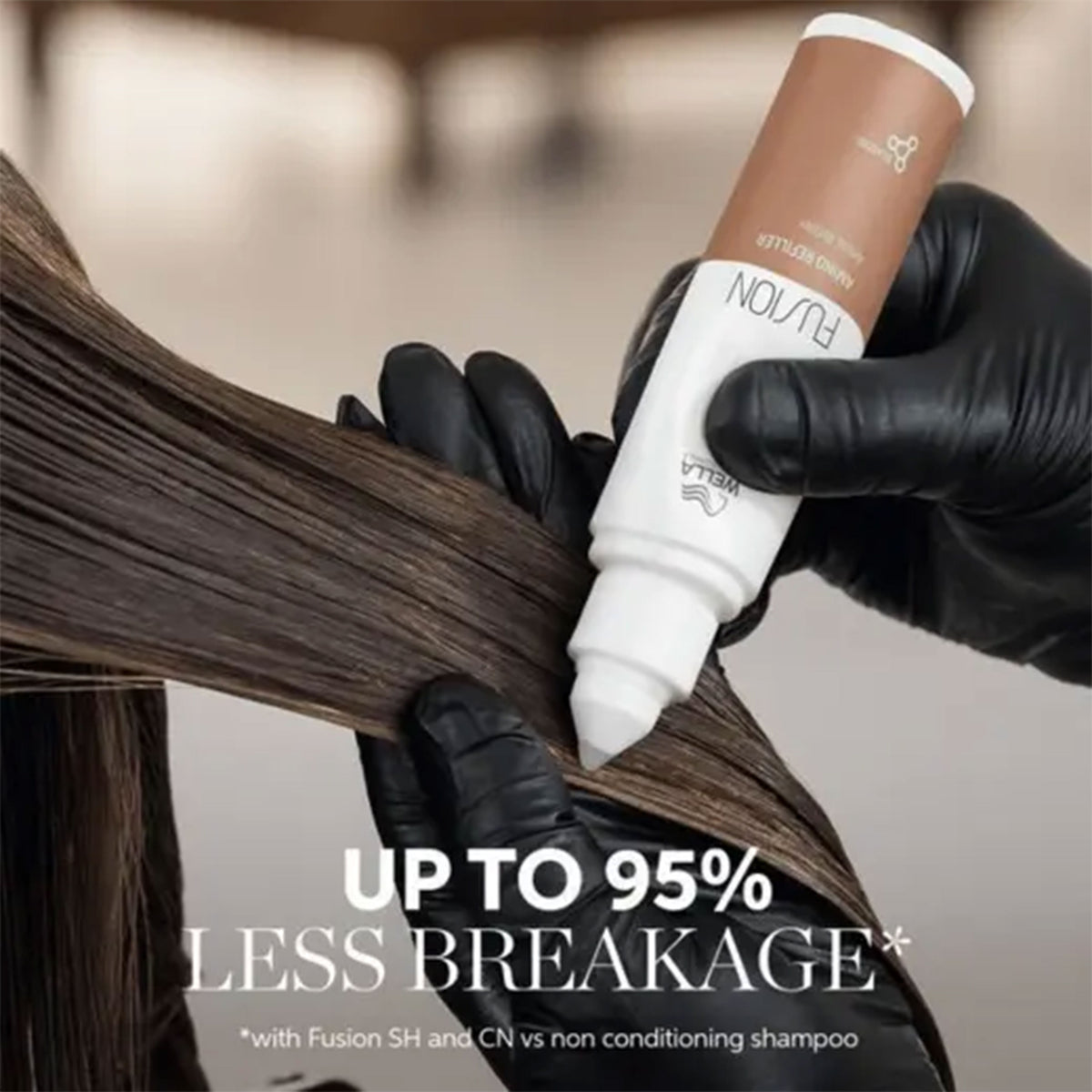 Person applying hair care product with text about reduced hair breakage
