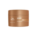 Brown jar of Wella Ultimate Smooth hair mask on a white background