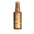 Wella bottle of Ultimate Smooth oil serum on a white background