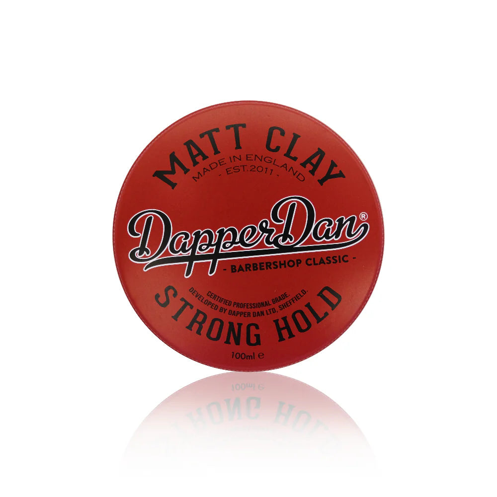 Red ball of Dapper Dan Matt Clay hair product on a white background