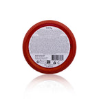 Red jar lid with a label on a white background