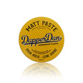 Yellow container of Dapper Dan Matt Paste on a white background