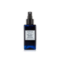 A blue bottle of Murdock sea salt spray with a black spray nozzle.