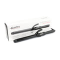 Black curling iron with packaging on a white background