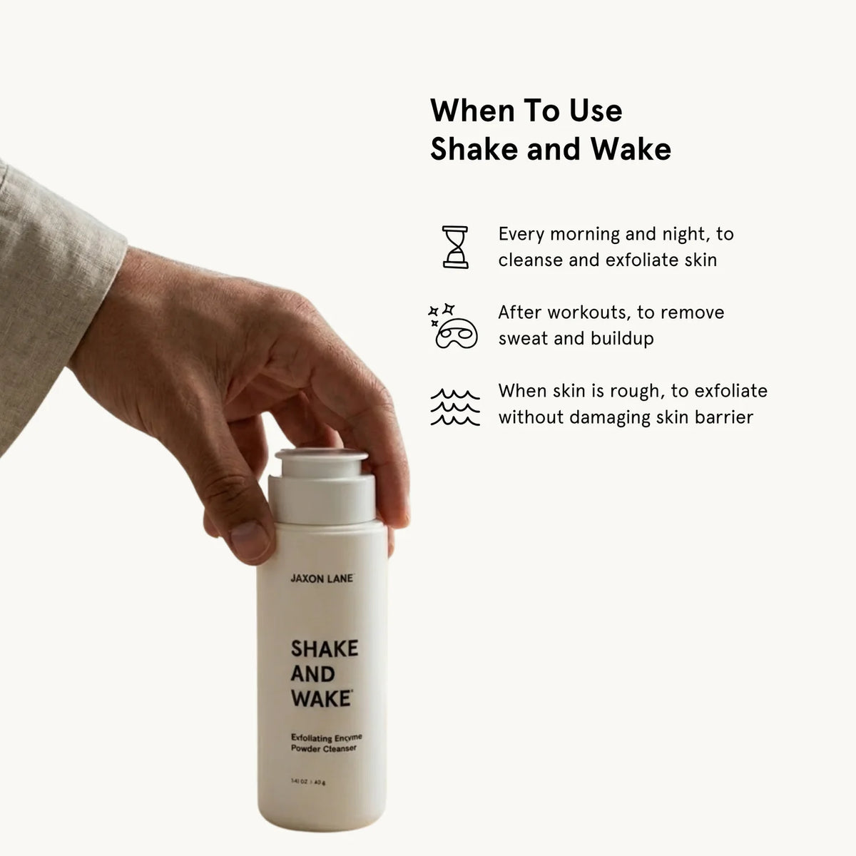 Hand holding a white bottle labeled 'Shake and Wake' with usage instructions on a white background.