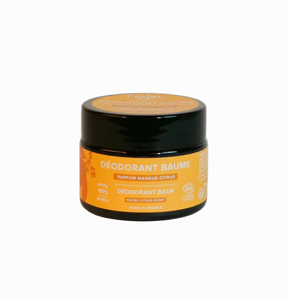 Deodorant balm jar with orange label on a white background