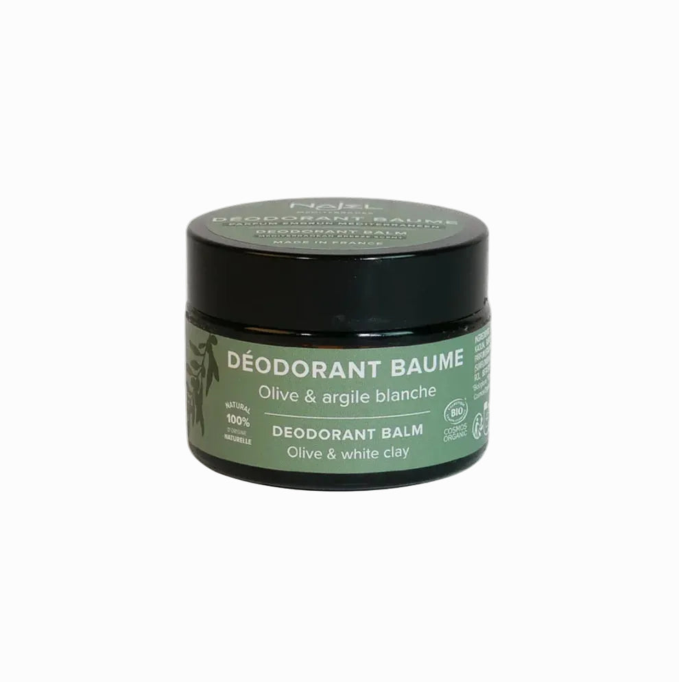 Deodorant balm jar with green label on a white background