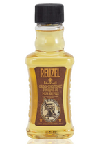 Reuzel grooming tonic bottle with black cap on a white background