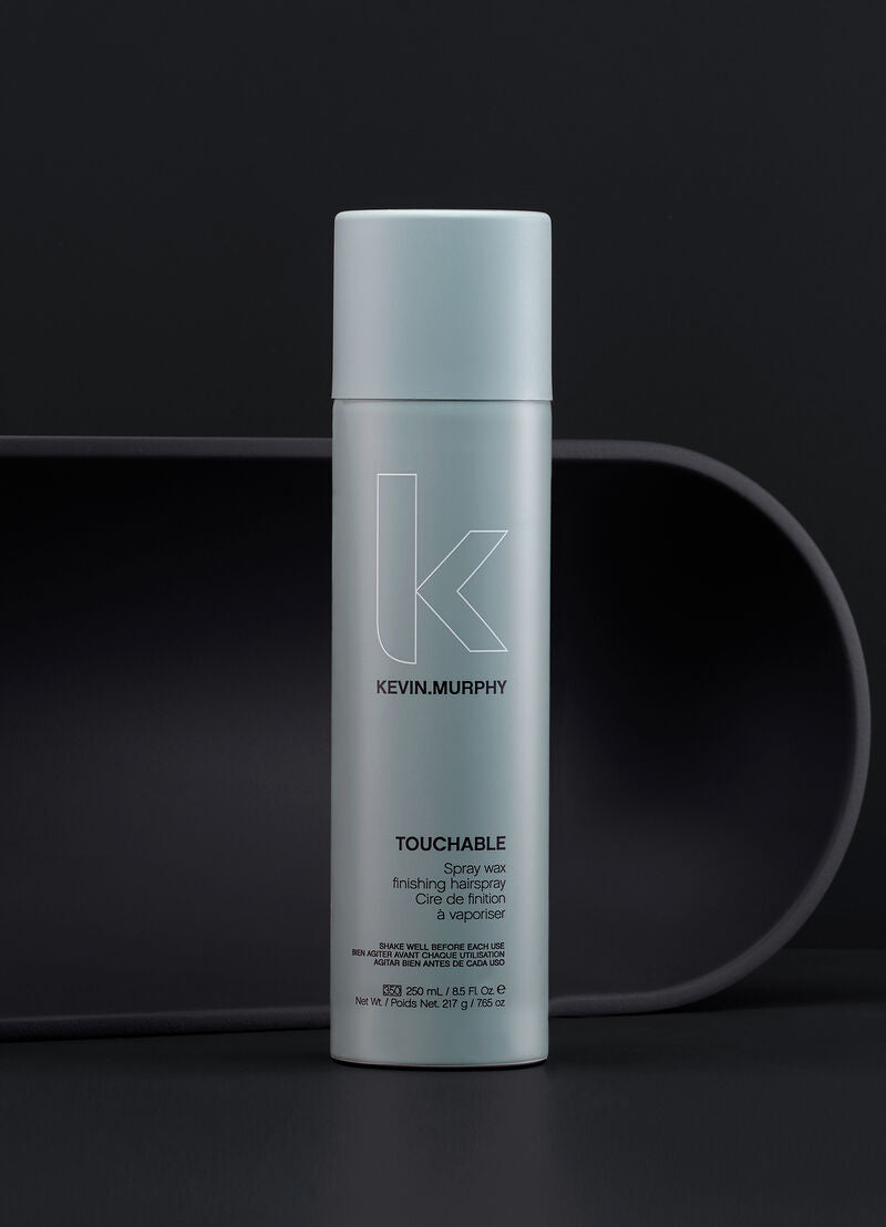 Kevin Murphy hair product bottle on a dark background