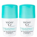 Two Vichy anti-perspirant rolls-on with blue caps on a white background