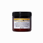 Hair treatment jar with label on a white background