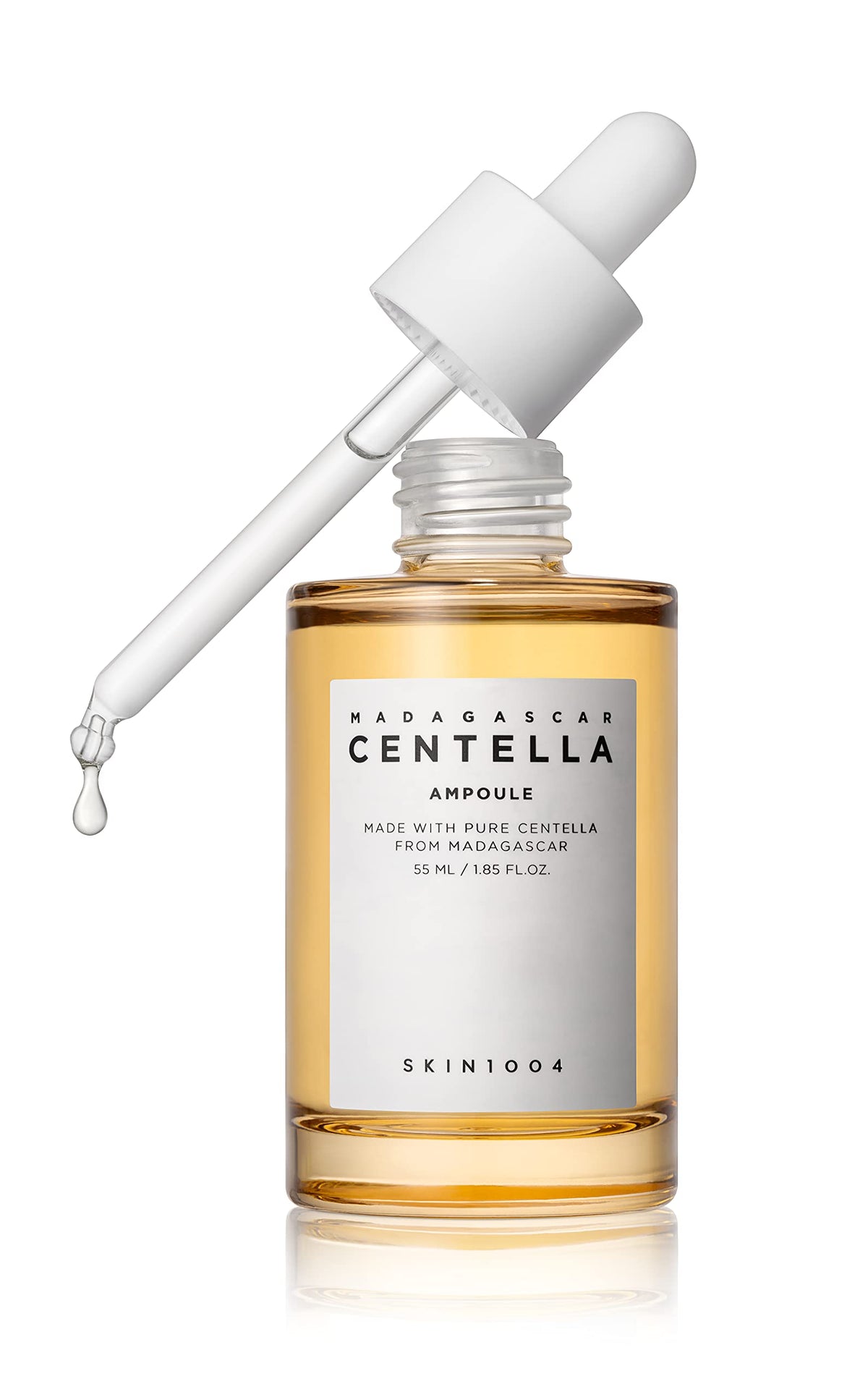 Skincare ampoule bottle with dropper labeled 'Madagascar Centella' on a white background