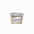 Clear plastic container with a label on a white background