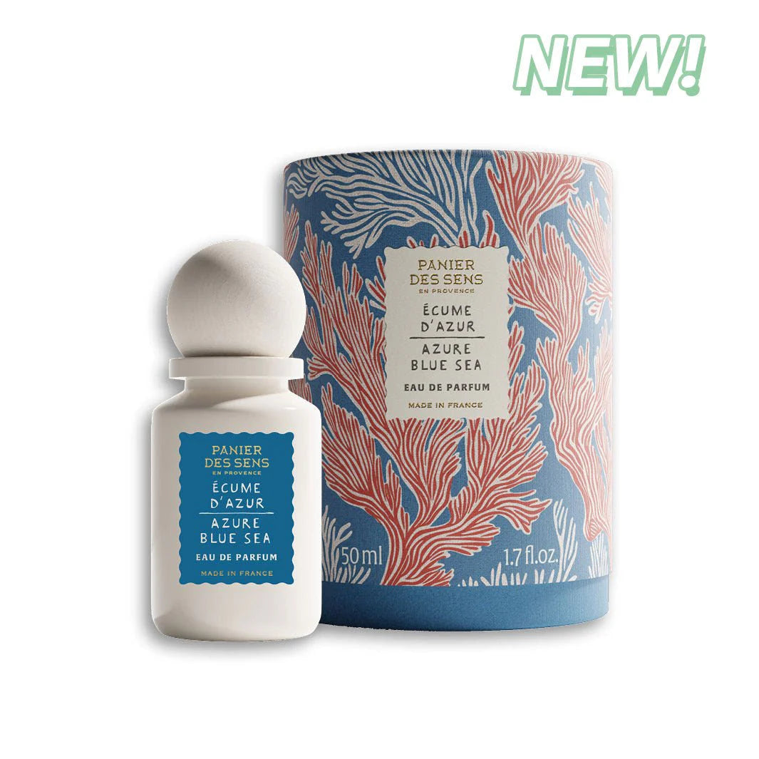 Perfume bottle and packaging with 'New!' label on a white background