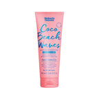 Pink tube of Umberto Gianni Coco Beach Waves hair product on a white background