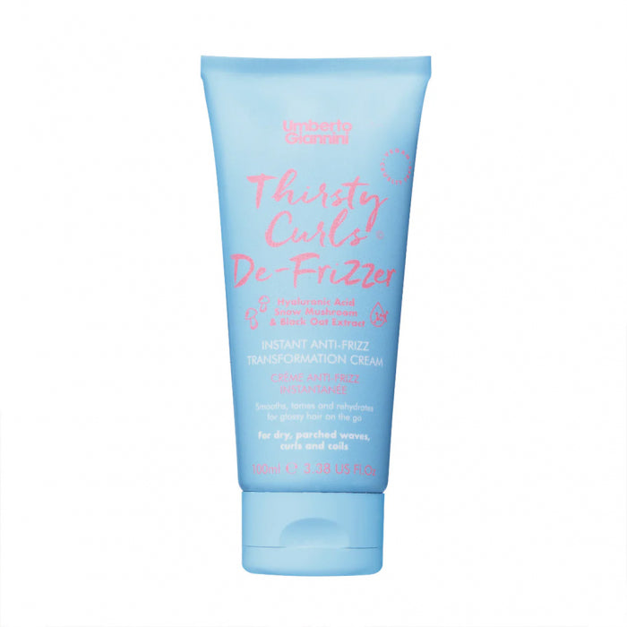 Blue tube of 'Thirsty Curls De-Frizzler' on a white background
