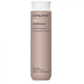 Living proof Frizz Conditioner in a tall, matte taupe bottle with a white cap, shown against a plain white background.